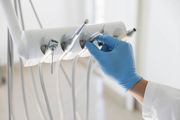 Professional Tooth Extraction technician working in Aptos, CA